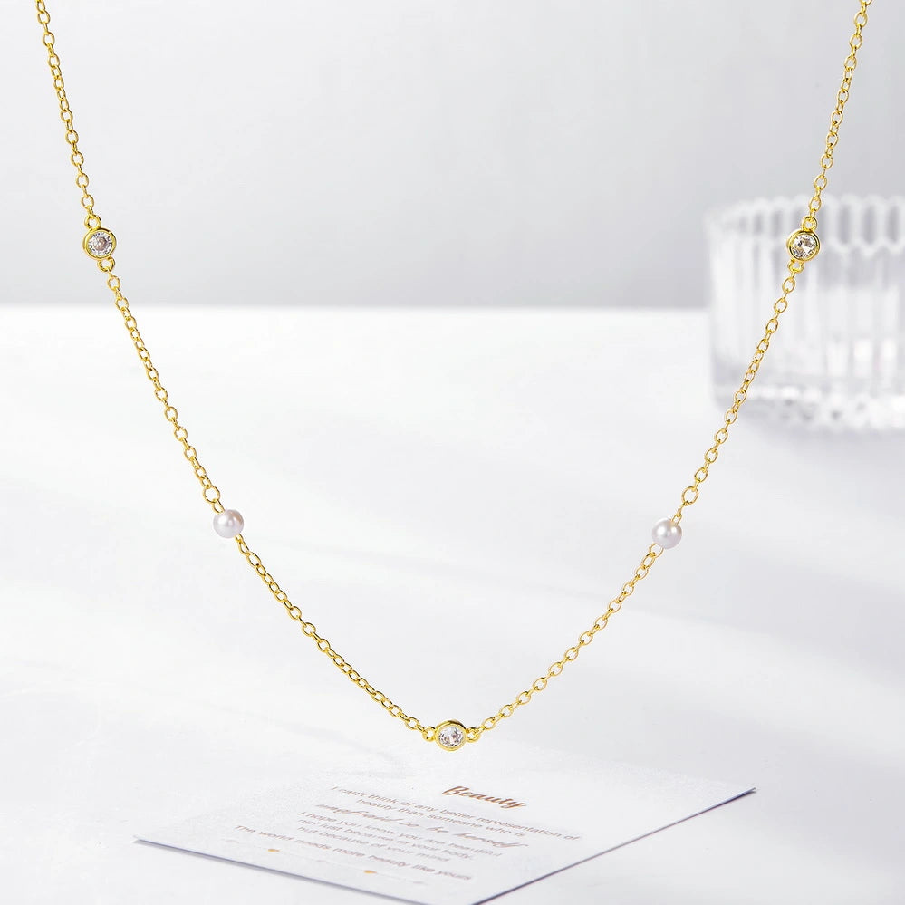 Detailed view of the Pearl and Rhinestone details on the Choker