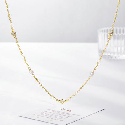 Detailed view of the Pearl and Rhinestone details on the Choker