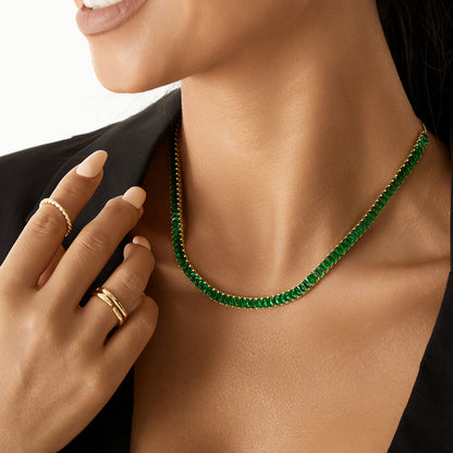Close-up of Green Baguette CZ in 14K Gold Tennis Necklace