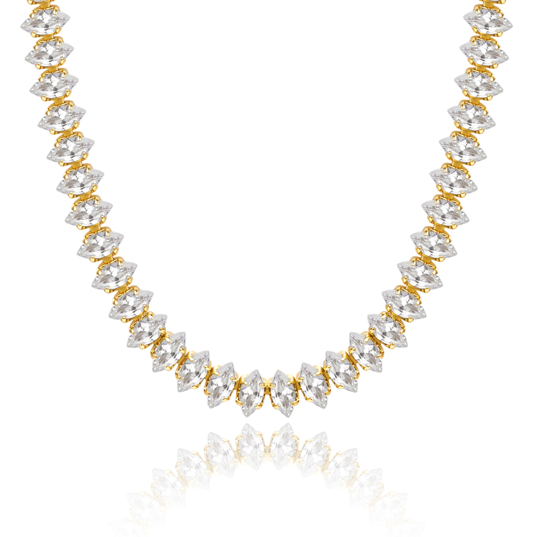 14K Gold Tennis Necklace with Oval CZ against white backdrop