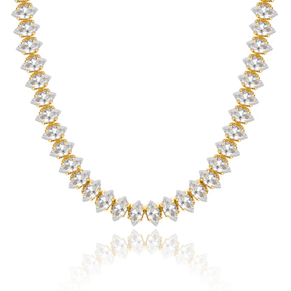 14K Gold Tennis Necklace with Oval CZ against white backdrop