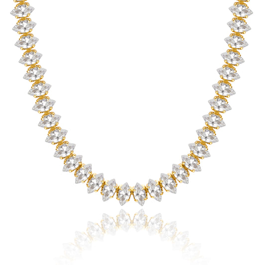14K Gold Tennis Necklace with Oval CZ against white backdrop